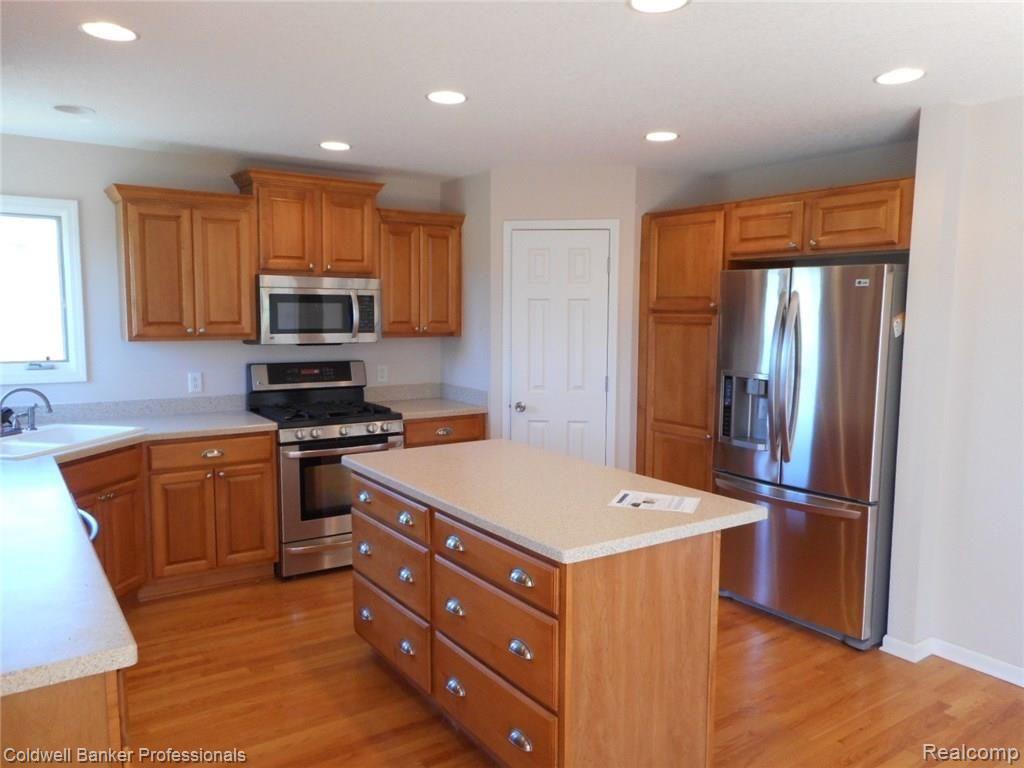 767 West Brocker Road Metamora, MI 48455 - Photo 12 of 62 Beautiful open kitchen with all stainless LG appliiances