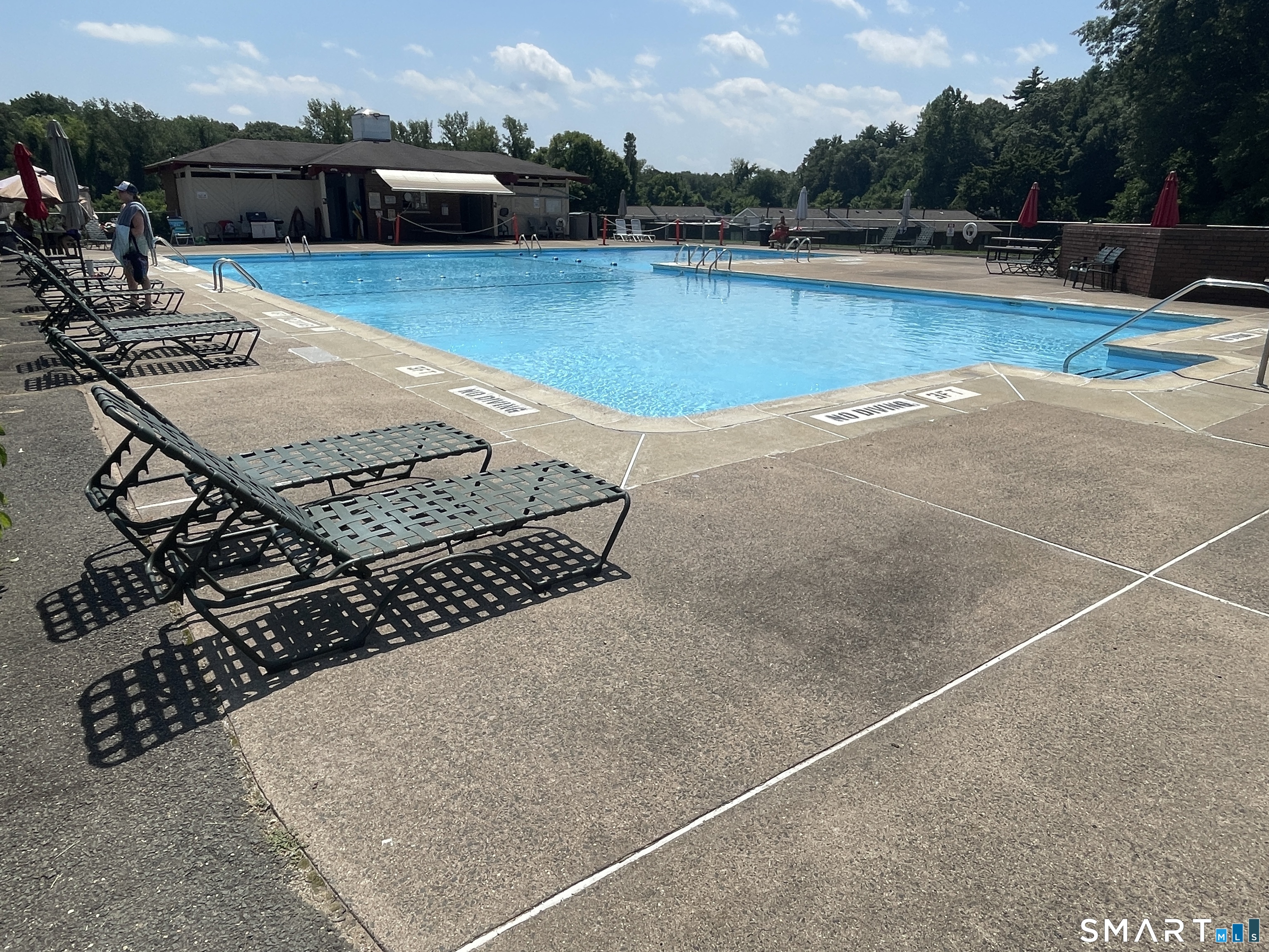 148 High Path Road, Unit 148 Windsor, CT 06095 - Photo 14 of 14 an outdoor space with swimming pool and furniture