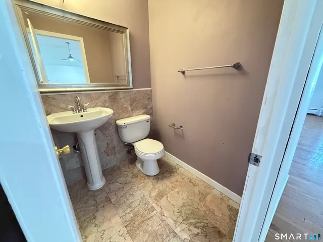 a bathroom with a sink and a toilet
