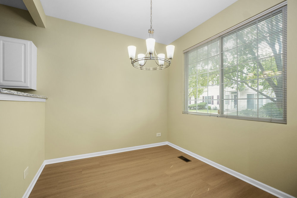 2277 Reflections Drive, Unit 2277 Aurora, IL 60502 - Photo 3 of 15 a view of a room with a large window