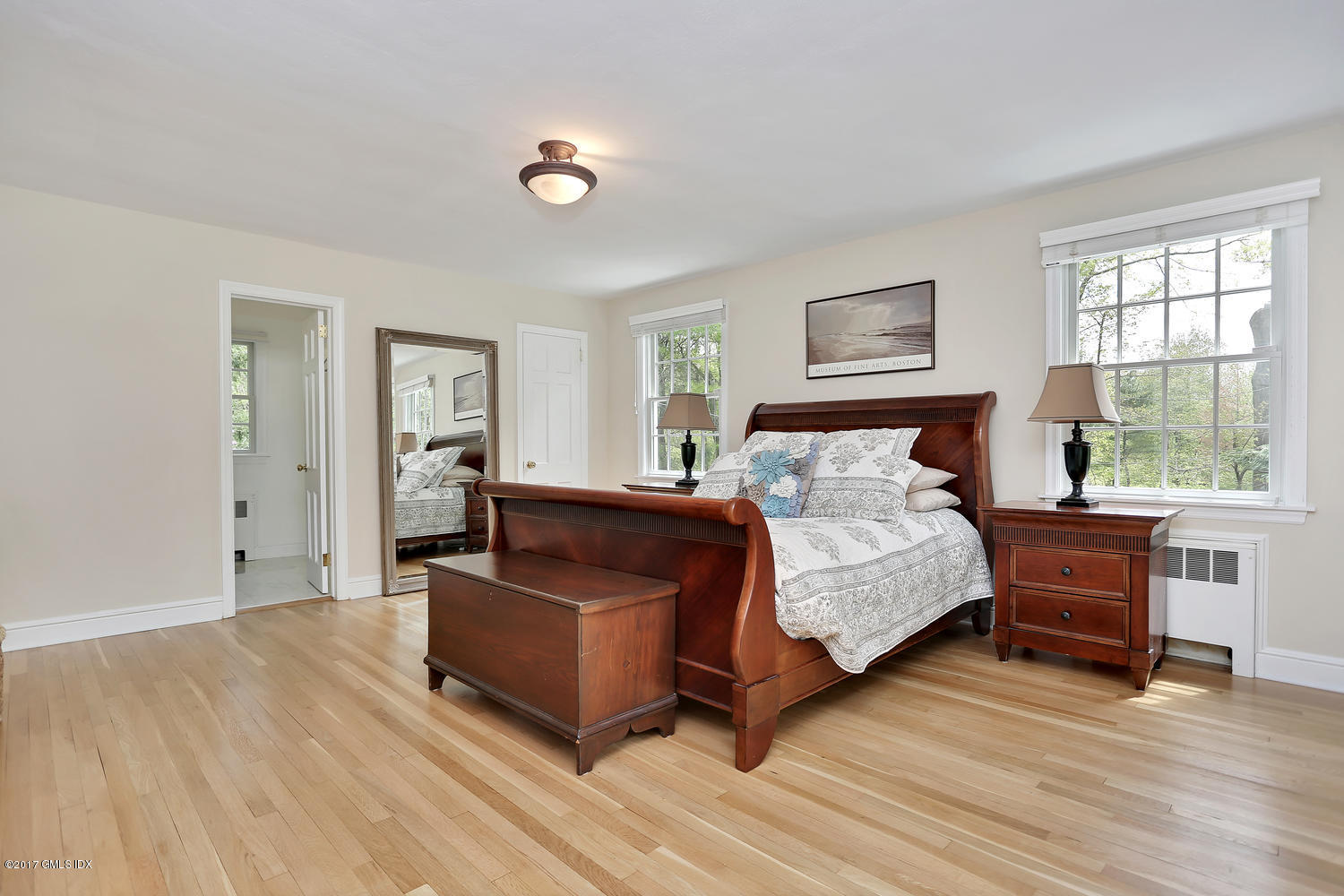 87 Hunting Ridge Road Stamford, CT 06903 - Photo 16 of 31 a bedroom with a bed and a couch