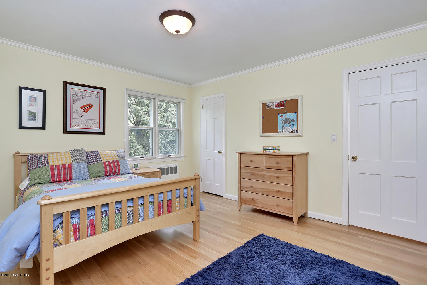 87 Hunting Ridge Road Stamford, CT 06903 - Photo 20 of 31 a bedroom with furniture and a window