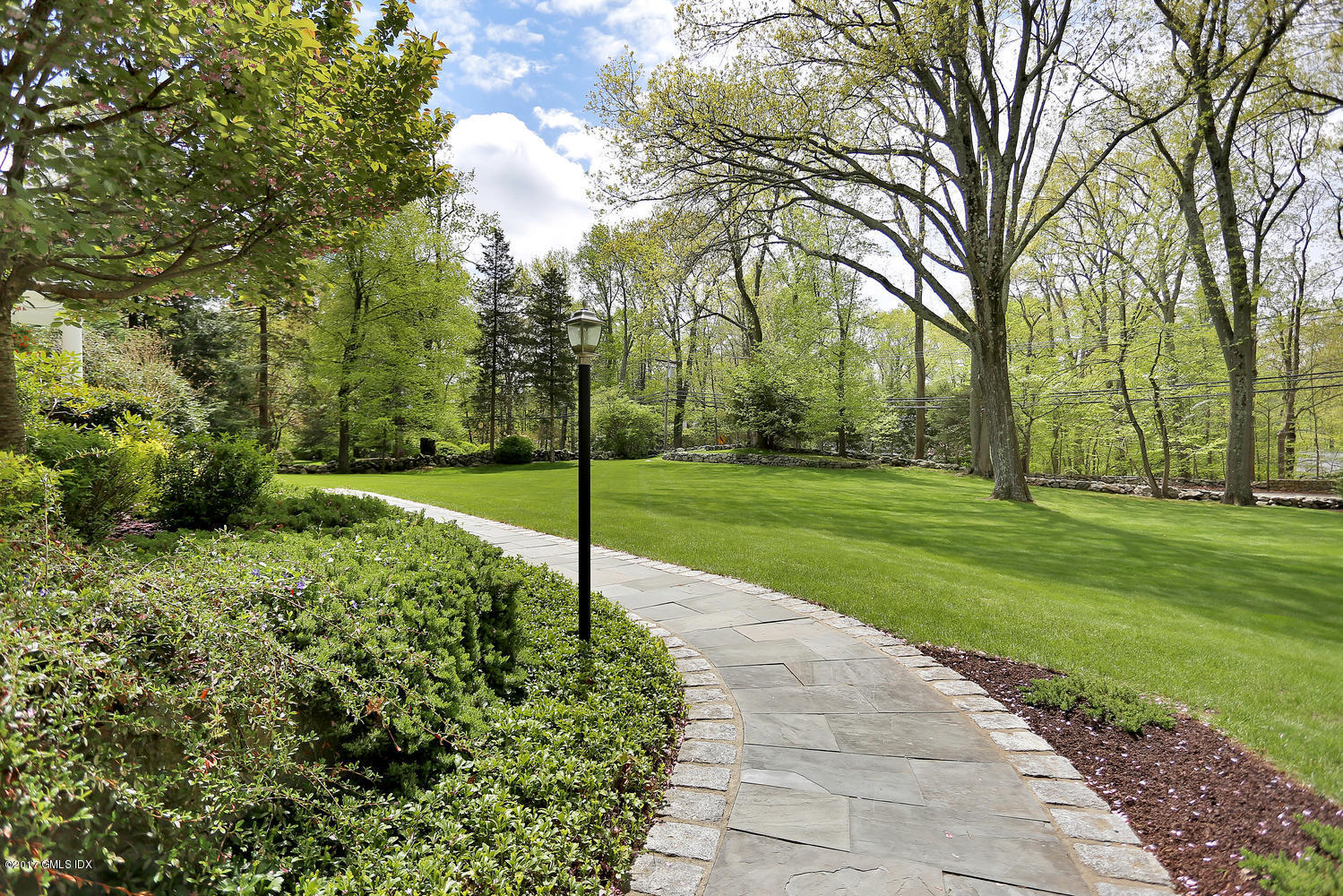 87 Hunting Ridge Road Stamford, CT 06903 - Photo 28 of 31 a view of a park with large trees
