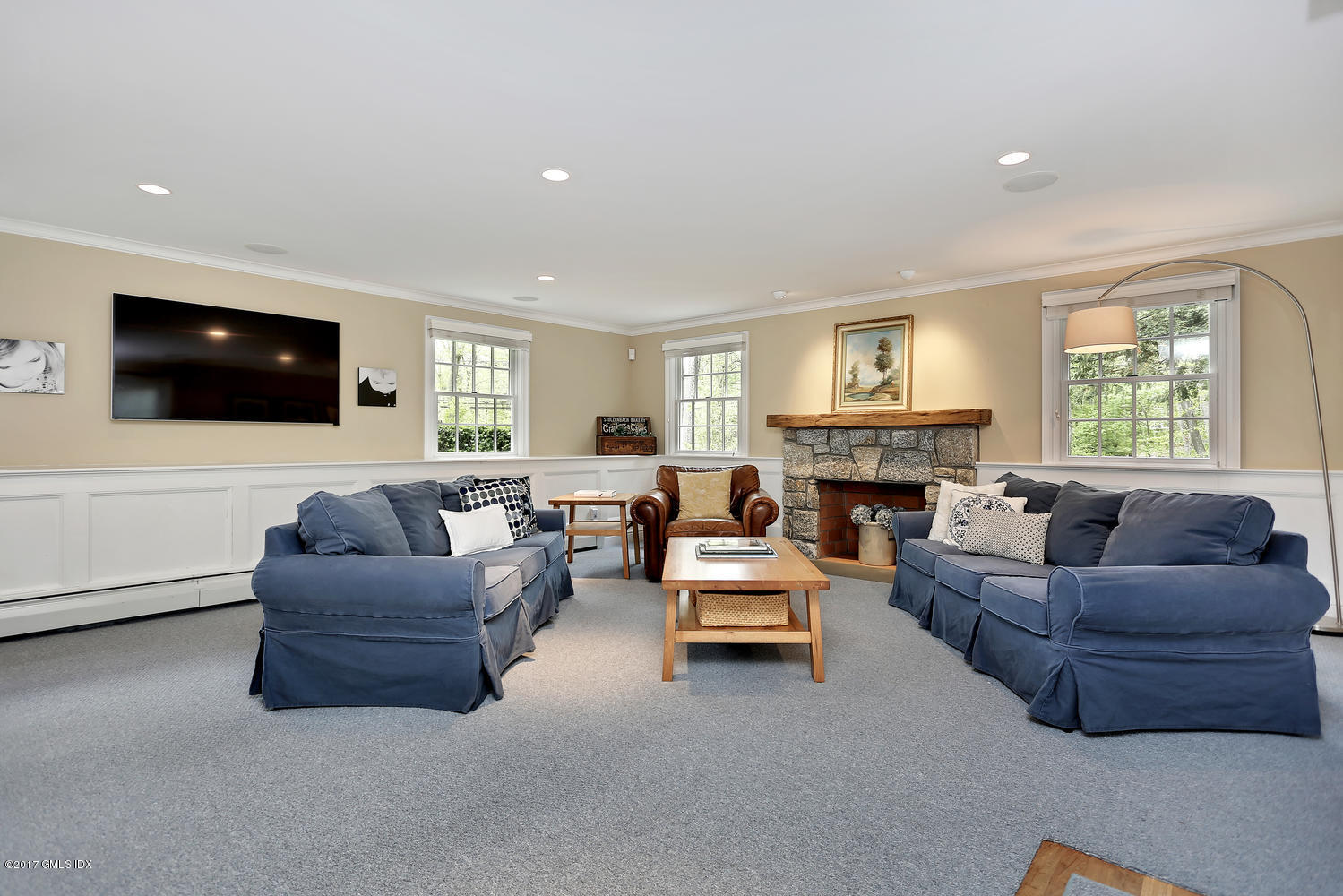87 Hunting Ridge Road Stamford, CT 06903 - Photo 9 of 31 a living room with furniture and a flat screen tv