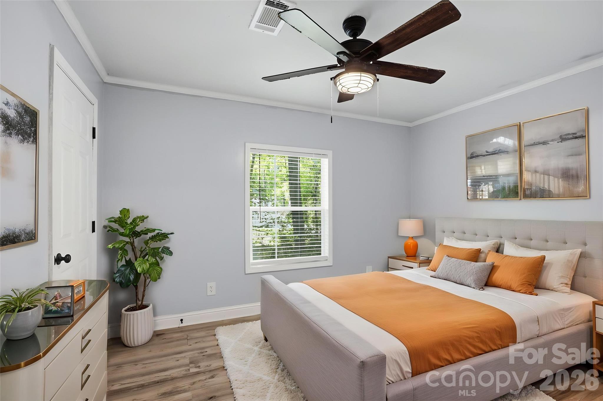 116 Springdale Drive York, SC 29745 - Photo 23 of 32 a bedroom with a large bed and a window