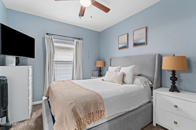 a view of a room with workspace and windows