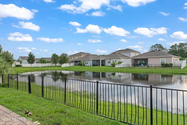 an aerial view of a house with a garden