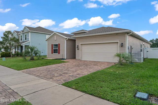 an aerial view of a city with lots of residential buildings