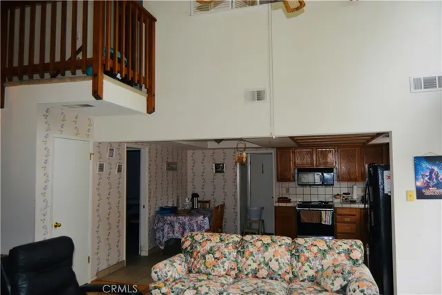 a bedroom with bed and furniture