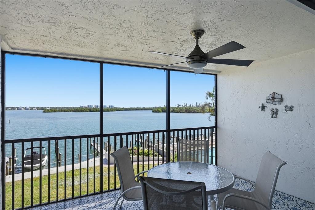 8977 Midnight Pass Road, Unit 223 Sarasota, FL 34242 - Photo 12 of 82 a view of a balcony with furniture
