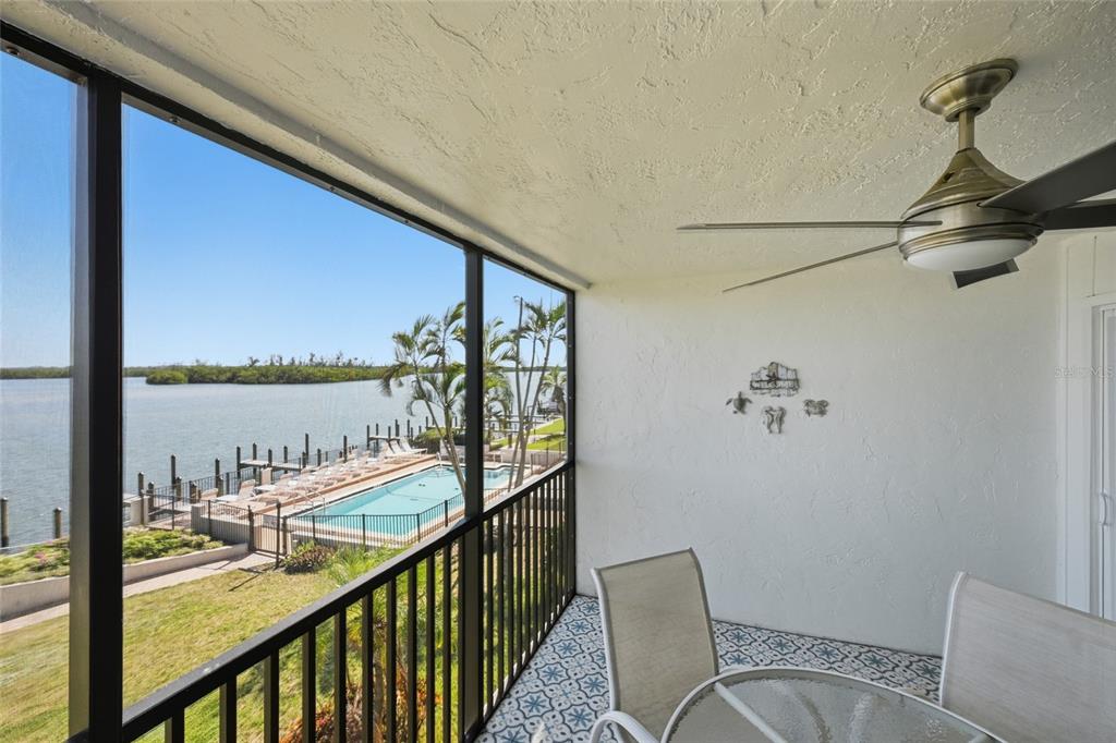 8977 Midnight Pass Road, Unit 223 Sarasota, FL 34242 - Photo 15 of 82 a view of a balcony with furniture