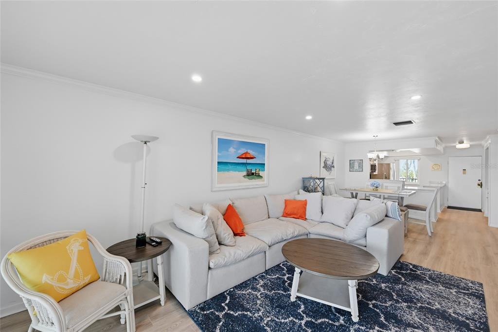 8977 Midnight Pass Road, Unit 223 Sarasota, FL 34242 - Photo 19 of 82 a living room with furniture and a couch