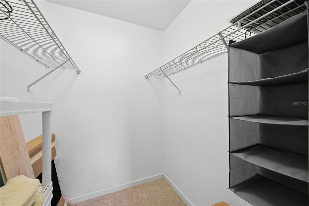 8977 Midnight Pass Road, Unit 223 Sarasota, FL 34242 - Photo 30 of 82 a view of small space with racks on the wall