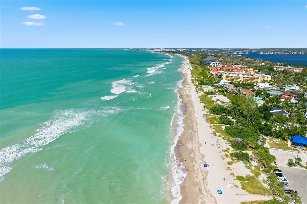 8977 Midnight Pass Road, Unit 223 Sarasota, FL 34242 - Photo 34 of 82 a view of a lake with a city