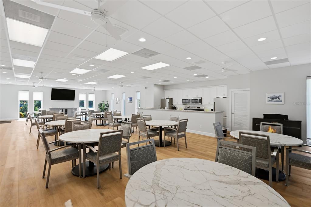 8977 Midnight Pass Road, Unit 223 Sarasota, FL 34242 - Photo 59 of 82 a living room with lots of furniture and kitchen view