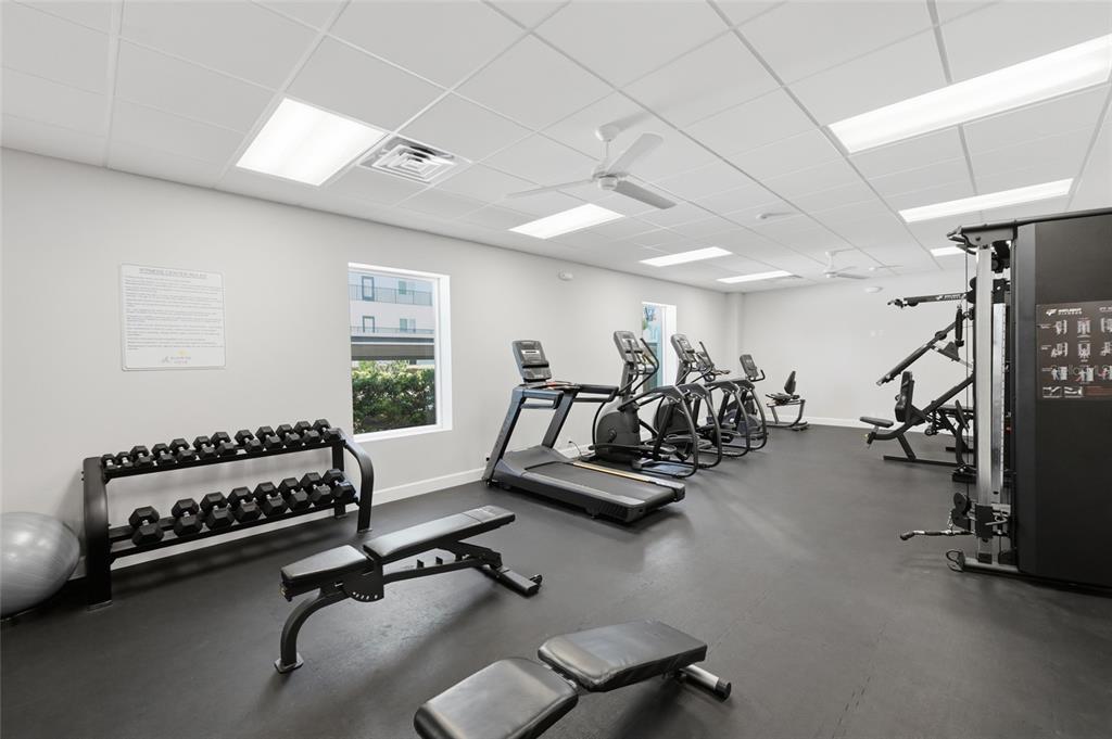 8977 Midnight Pass Road, Unit 223 Sarasota, FL 34242 - Photo 62 of 82 a view of a room with gym equipment