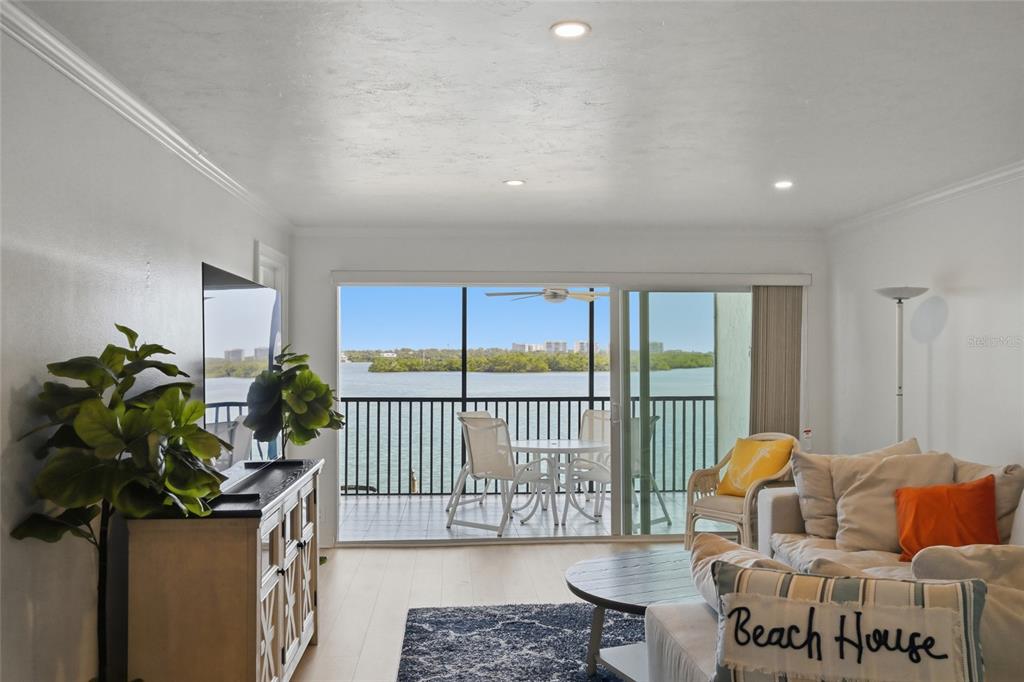 8977 Midnight Pass Road, Unit 223 Sarasota, FL 34242 - Photo 10 of 82 a living room with furniture