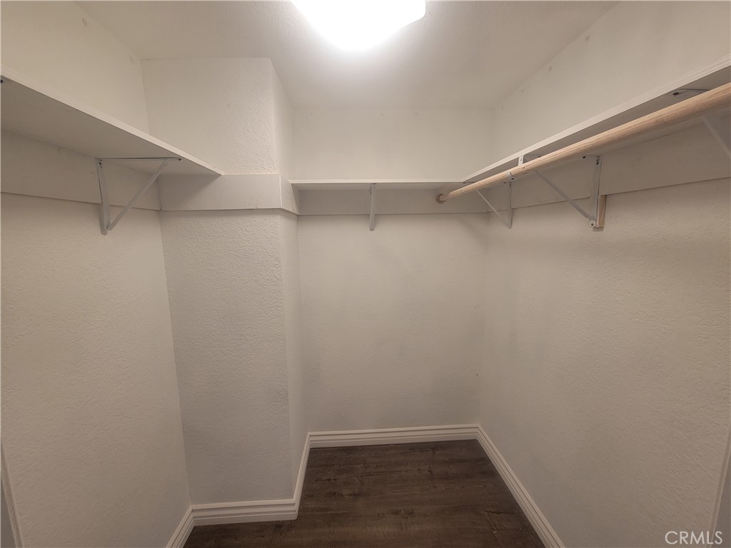 15005 Indiana Paramount, CA 90723 - Photo 5 of 7 a view of a room with shelf on the wall