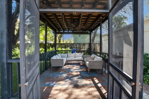 a view of a backyard of the house