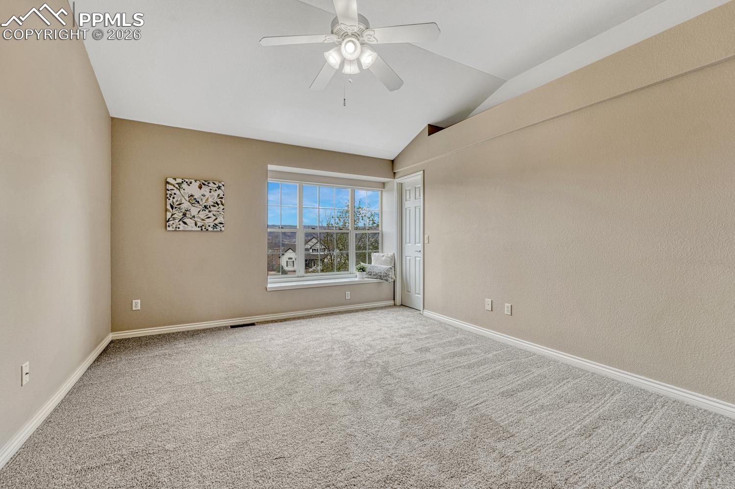 15211 Ridgefield Lane Colorado Springs, CO 80921 - Photo 24 of 47 Spacious upper level secondary bedrooms with vaulted ceilings and natural light