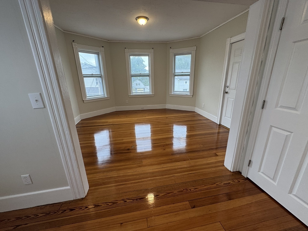72 Forest Street, Unit 2 Attleboro, MA 02703 - Photo 2 of 10 a view of front door with wooden floor