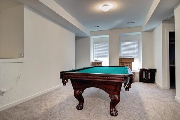 a room with furniture and windows