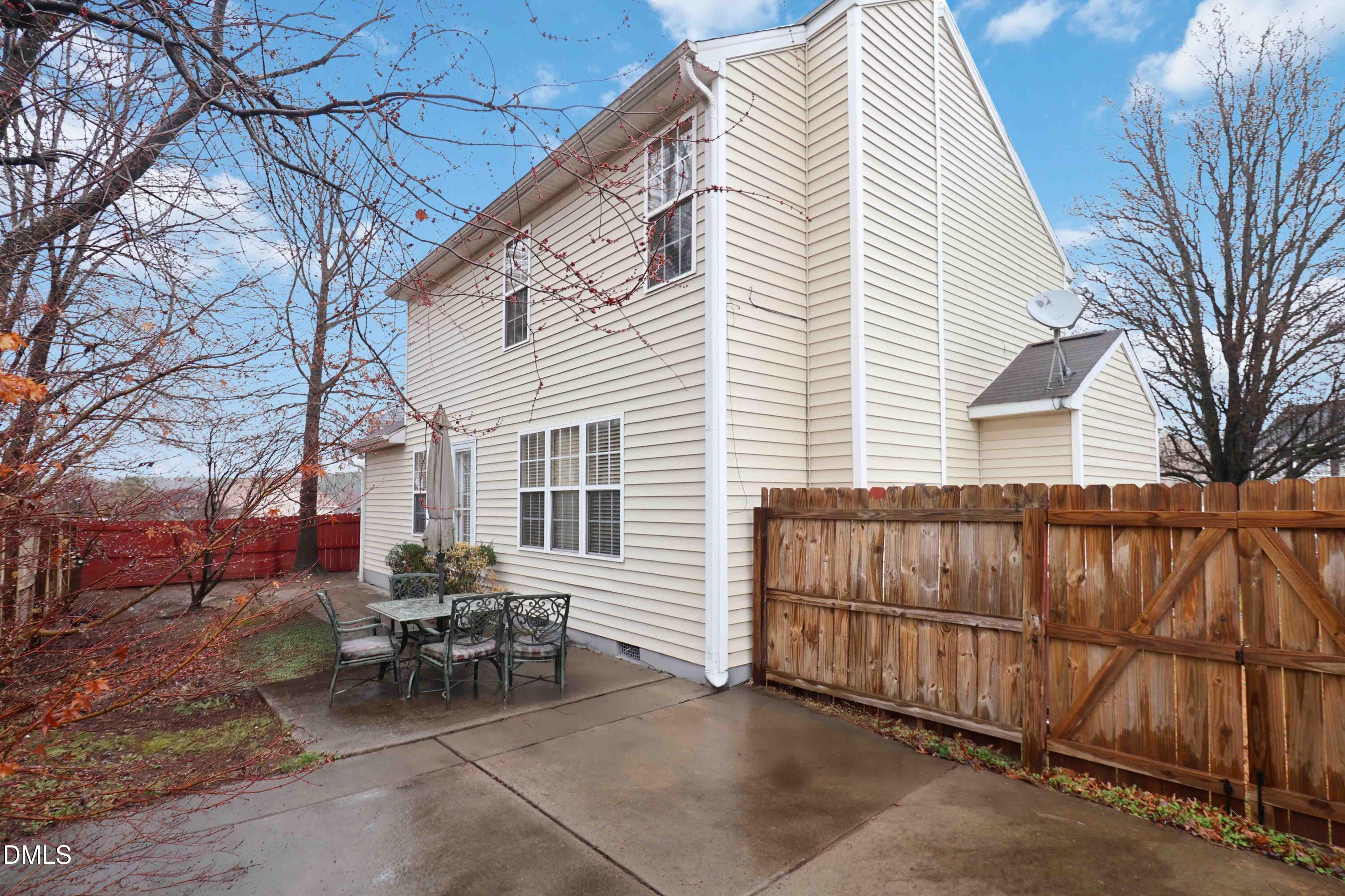 1504 Springshire Court Raleigh, NC 27610 - Photo 15 of 16 a view of a house with a patio