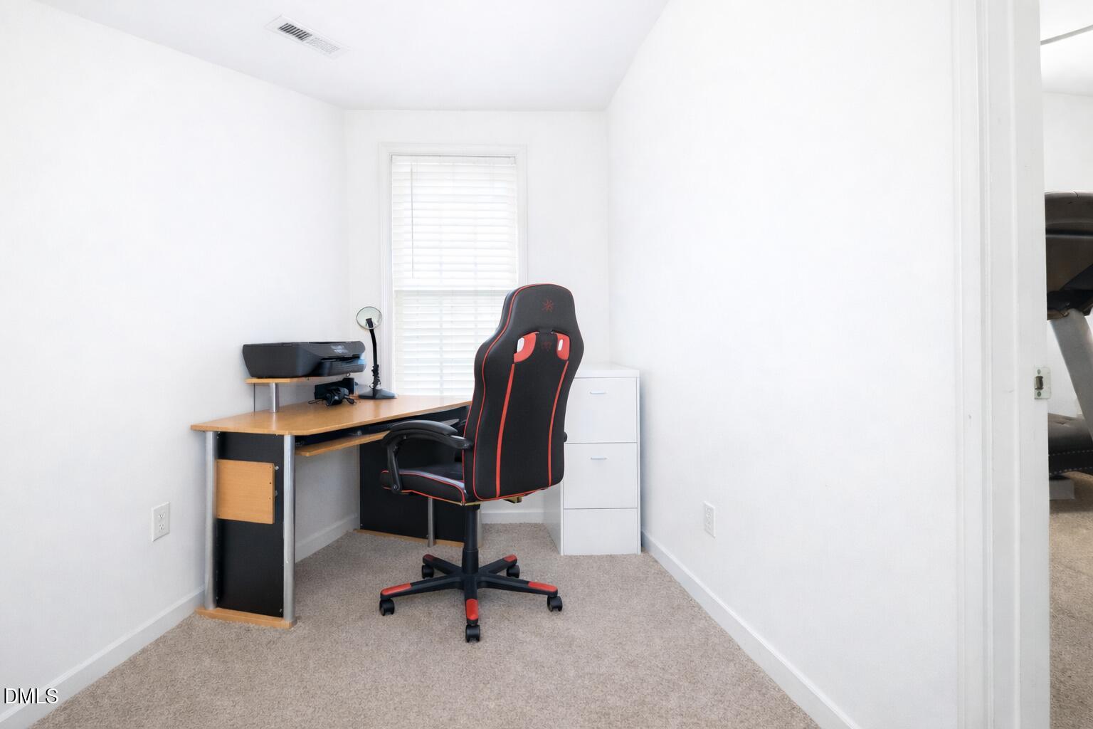 1504 Springshire Court Raleigh, NC 27610 - Photo 9 of 16 a view of a workspace with a window