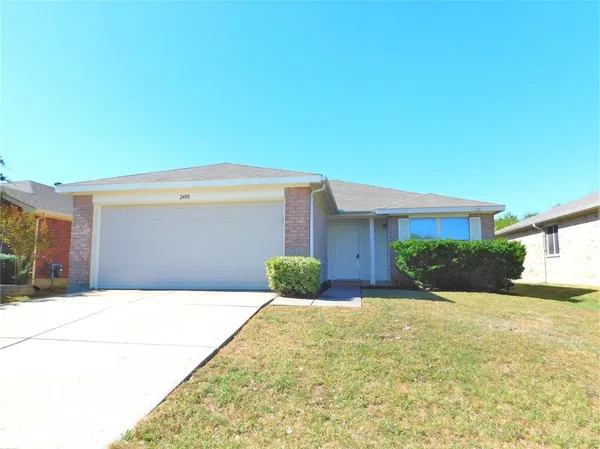 a front view of house with yard