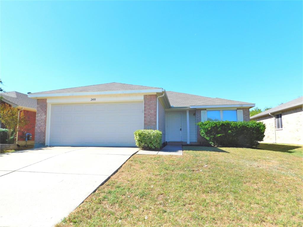 a front view of house with yard