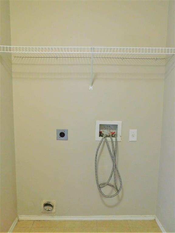 2408 Rolling Ridge Drive Little Elm, TX 75068 - Photo 11 of 25 a bathroom with a shower