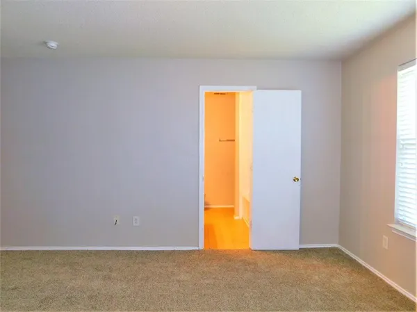 an empty room with window