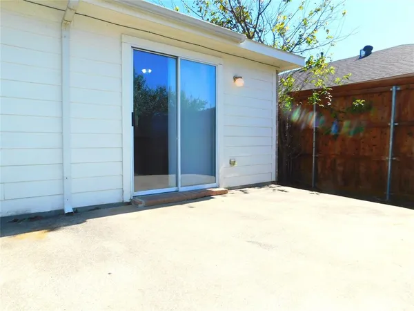 a house view with a backyard space
