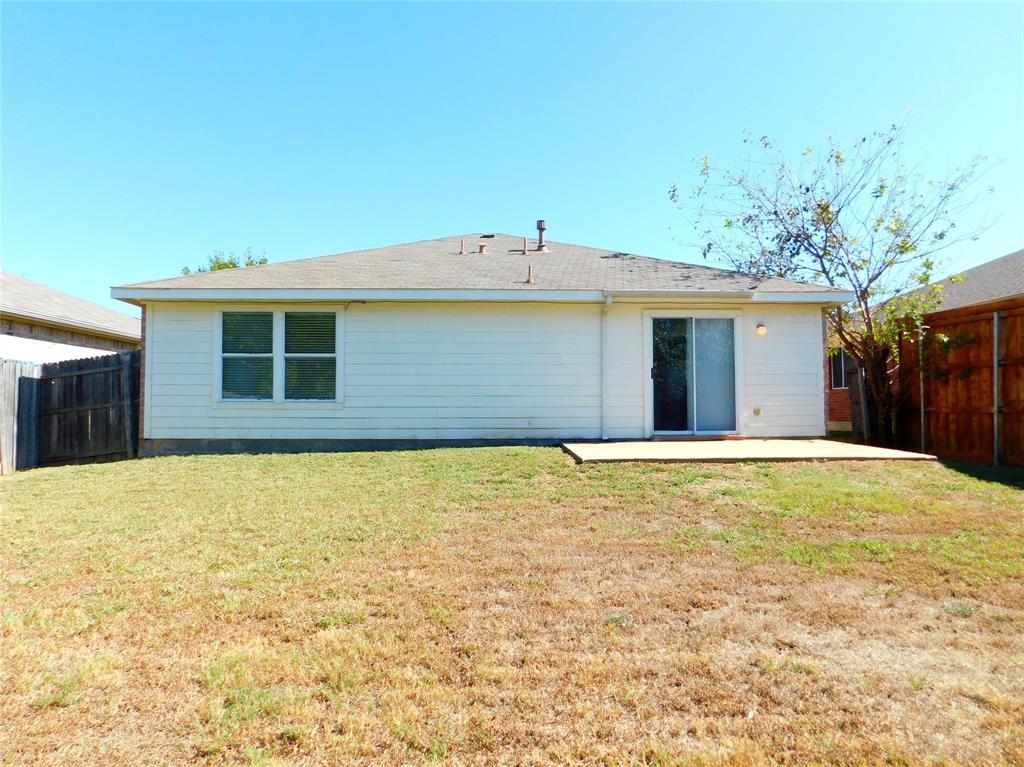 2408 Rolling Ridge Drive Little Elm, TX 75068 - Photo 25 of 25 a house view with a backyard space