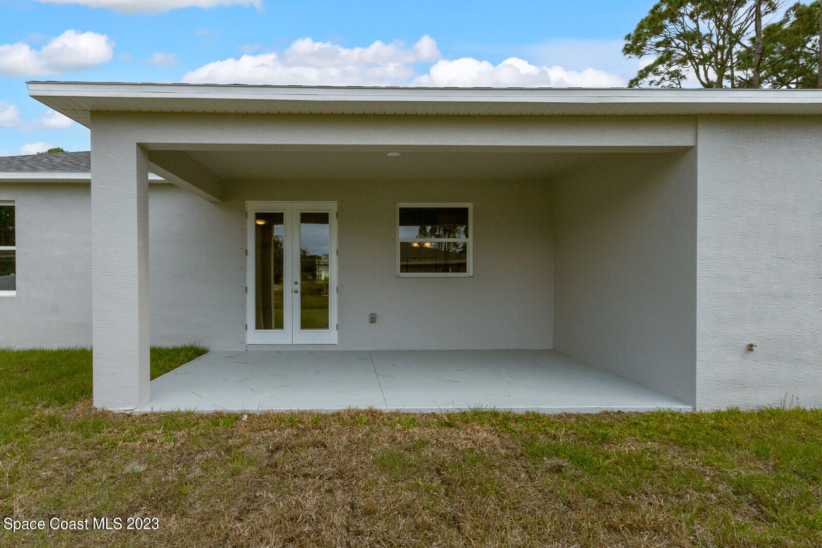 931 Thompson Road Southwest Palm Bay, FL 32908 - Photo 4 of 24 a view of an entrance of the house