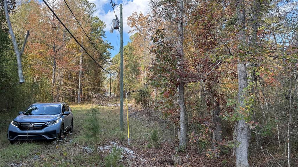618 South Steel Bridge Road Eatonton, GA 31024 - Photo 14 of 20 a backyard of a house with outdoor seating