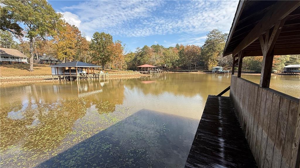 618 South Steel Bridge Road Eatonton, GA 31024 - Photo 7 of 20 a view of a lake with a mountain