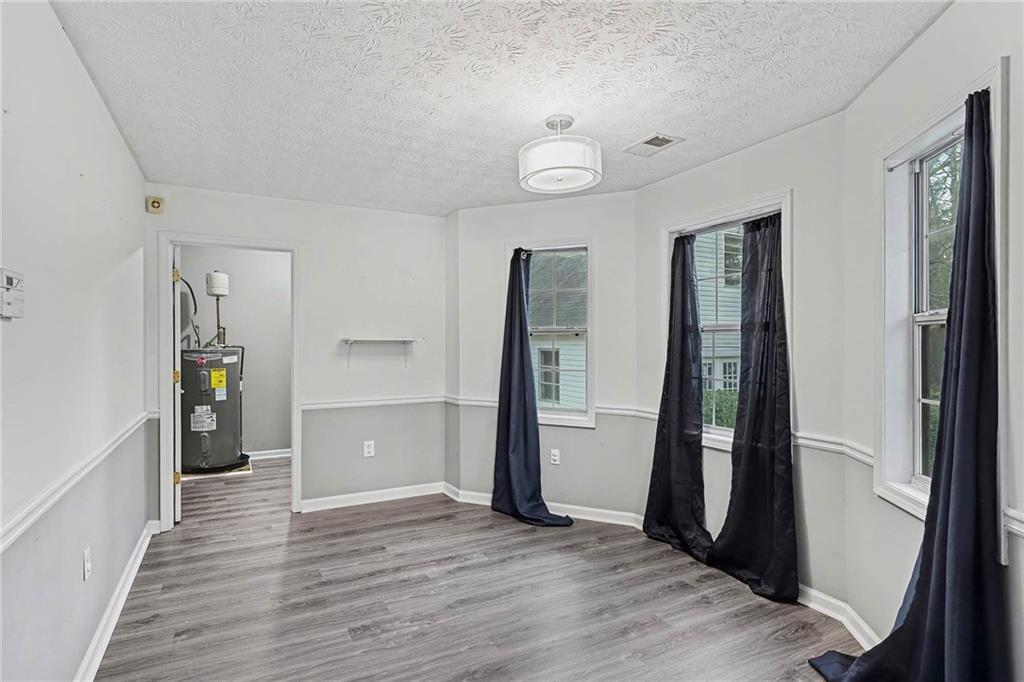 1752 Highway 162 Covington, GA 30016 - Photo 15 of 29 wooden floor in an empty room
