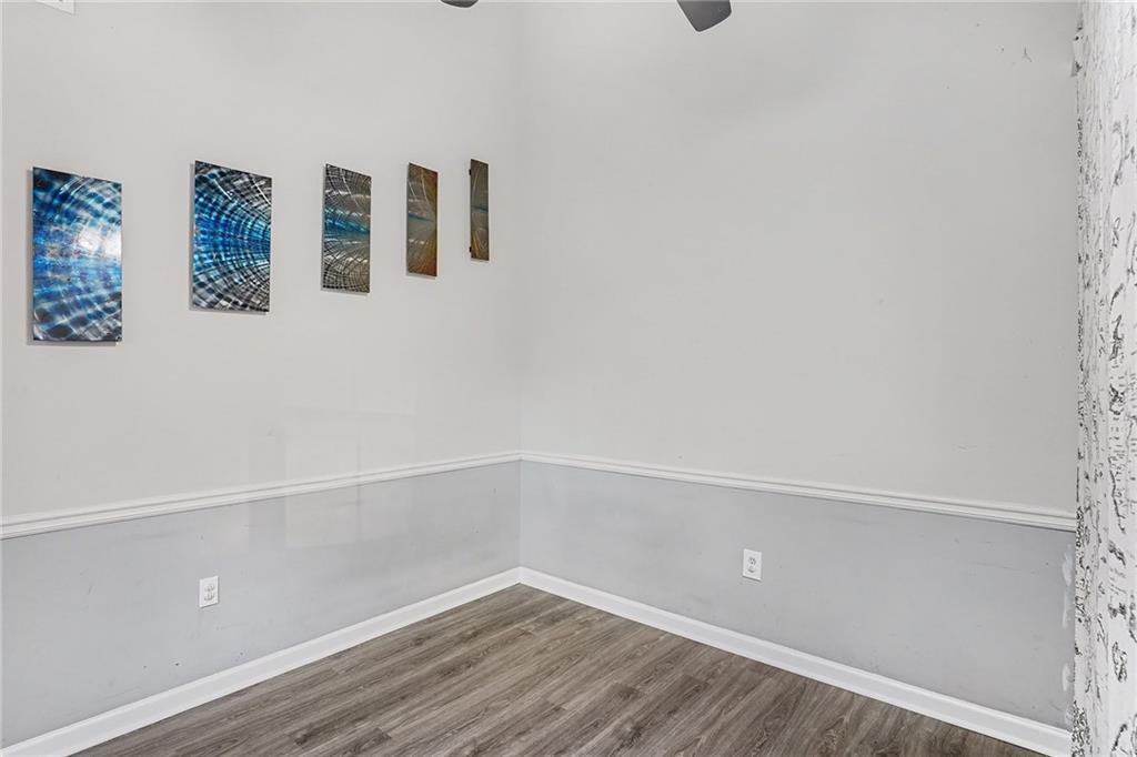 1752 Highway 162 Covington, GA 30016 - Photo 18 of 29 a view of an empty room with wooden floor