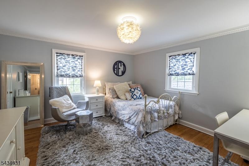 200 Wychwood Road Westfield, NJ 07090 - Photo 20 of 31 a spacious bedroom with a bed and a window