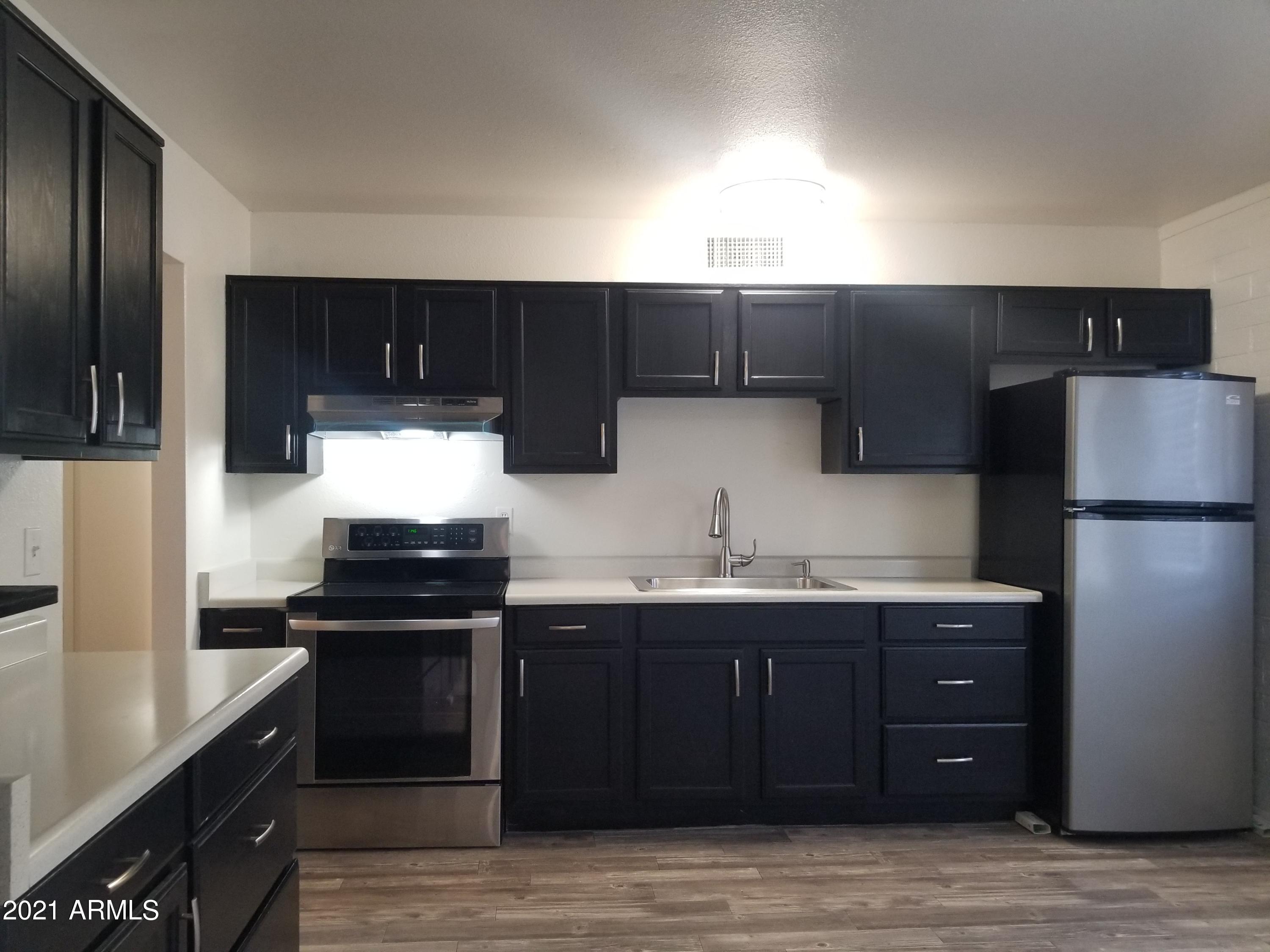 1810 West Alta Vista Road Phoenix, AZ 85041 - Photo 7 of 20 20210308_121627