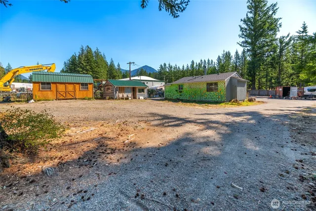 a view of street with large trees