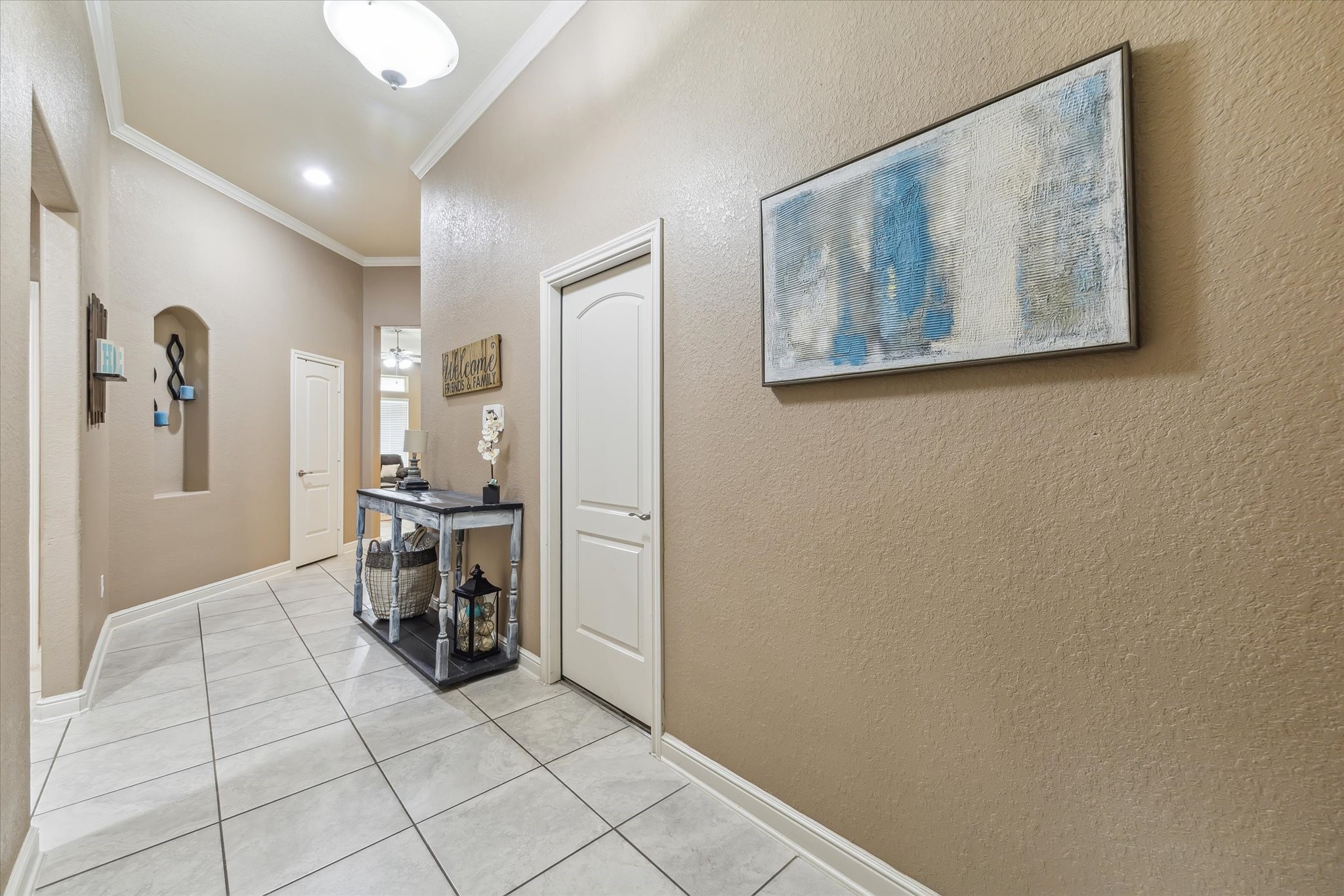 4914 Mountain Maple Trail Rosenberg, TX 77471 - Photo 4 of 24 Step into a grand private entryway with soaring ceilings and abundant natural light creating a warm and inviting first impression for guests.