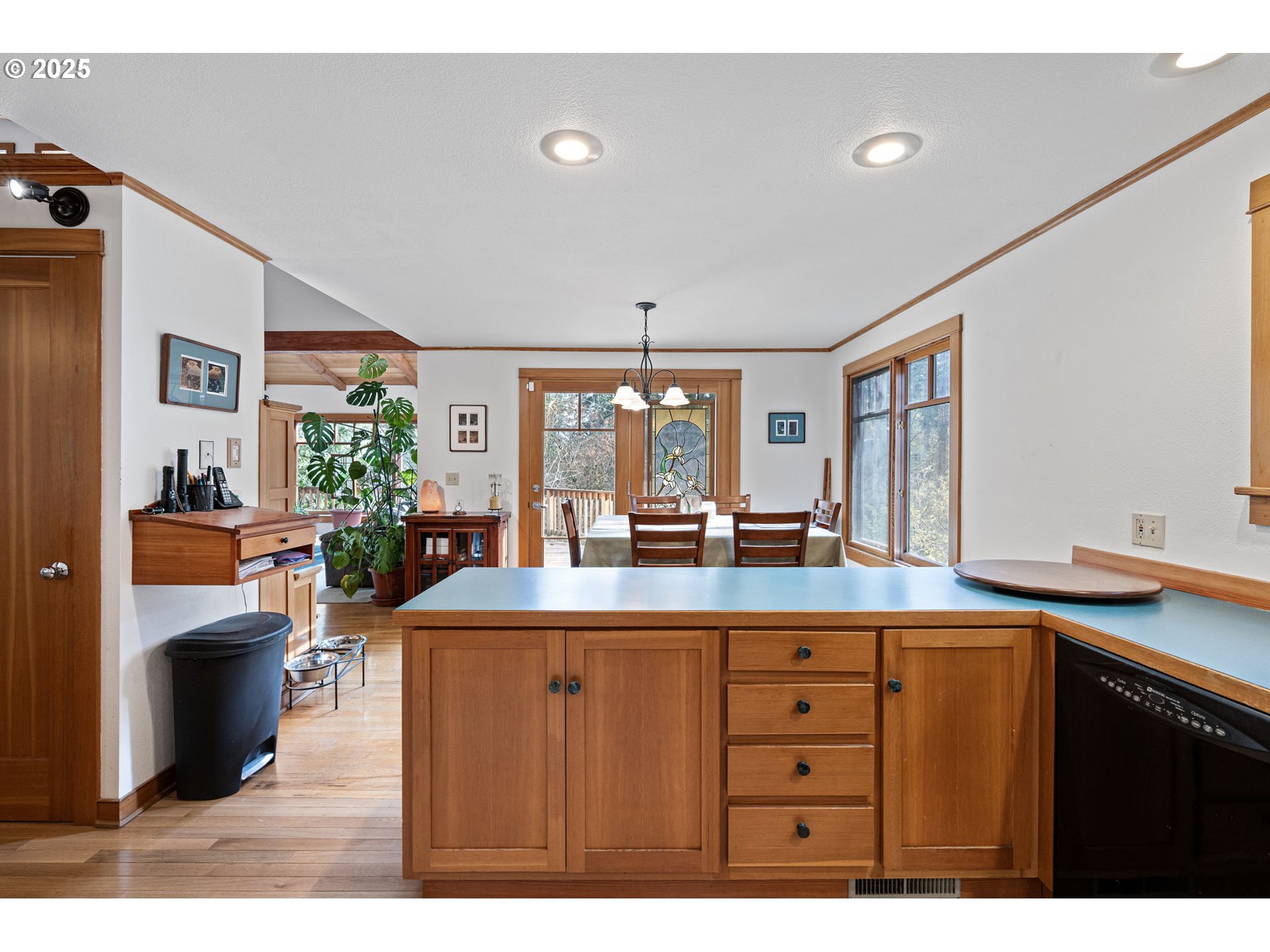 1867 Fircrest Drive Eugene, OR 97403 - Photo 17 of 48 a kitchen with granite countertop a sink and cabinets