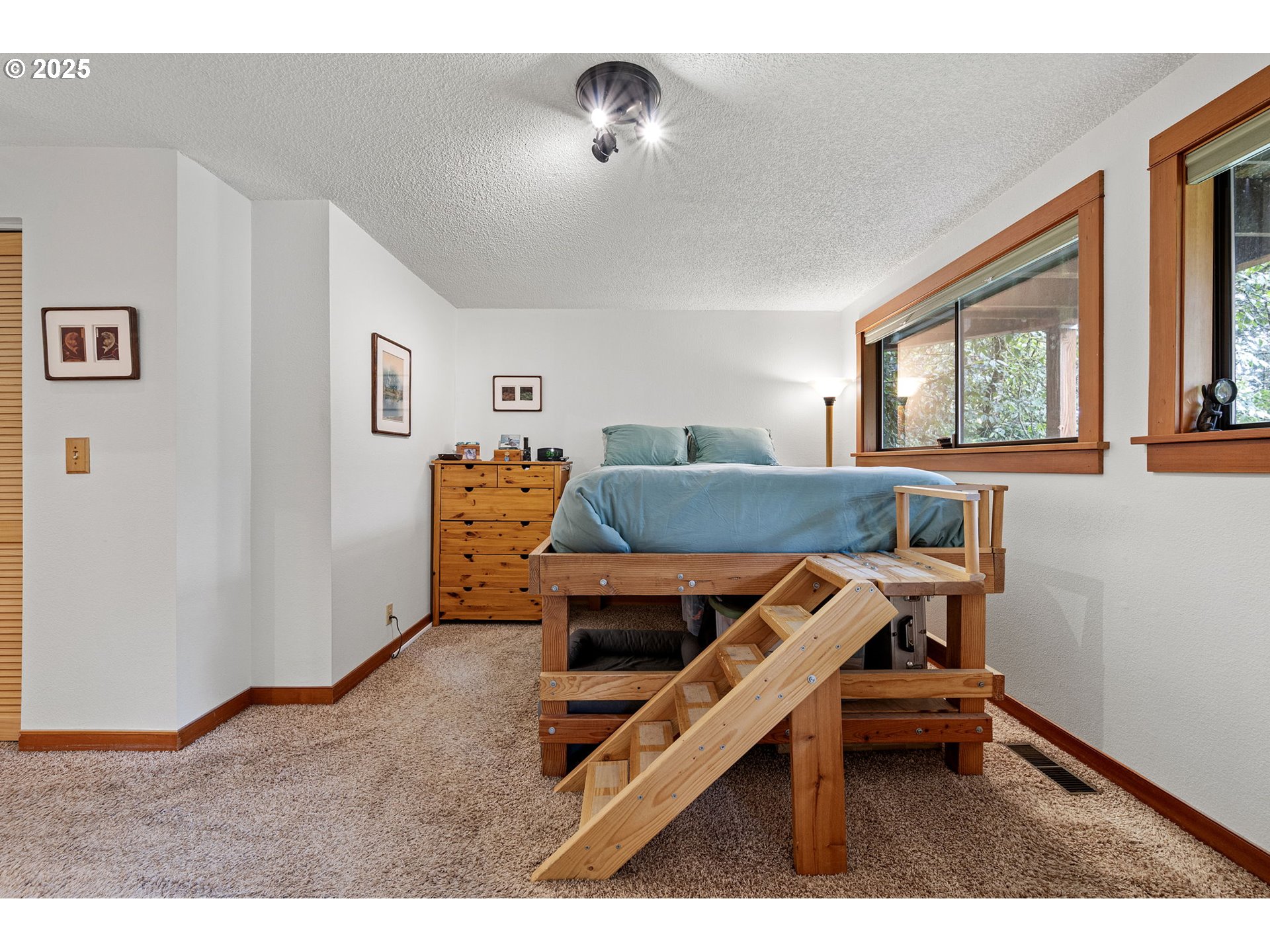 1867 Fircrest Drive Eugene, OR 97403 - Photo 27 of 48 a bedroom with furniture and a window