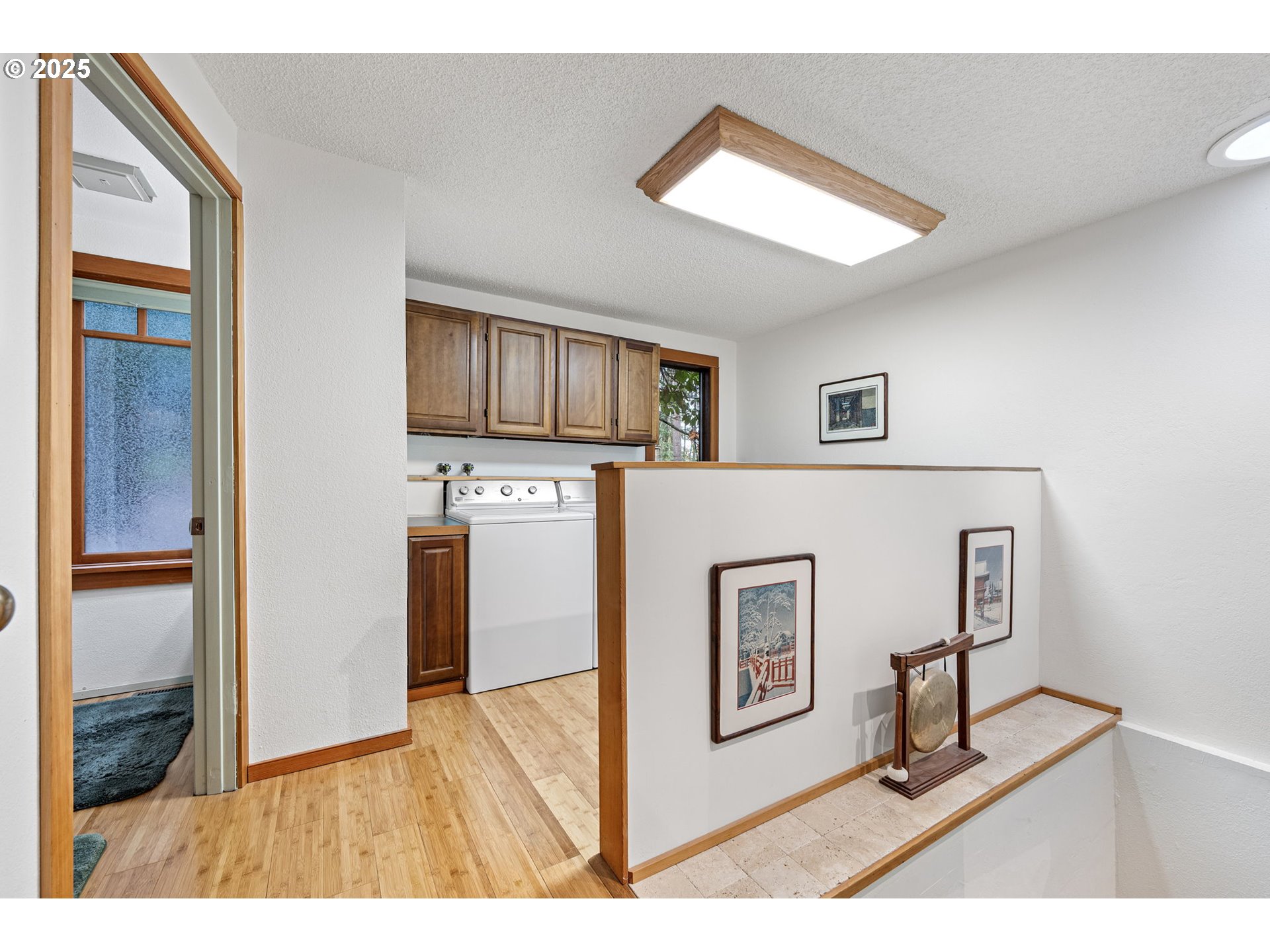 1867 Fircrest Drive Eugene, OR 97403 - Photo 31 of 48 a living room with stainless steel appliances kitchen island granite countertop furniture and a window