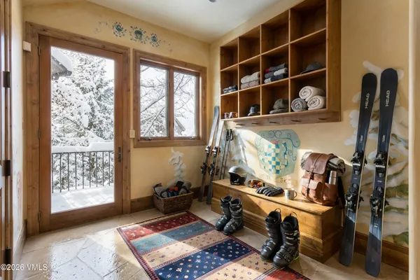 a bedroom with a bed and a fireplace