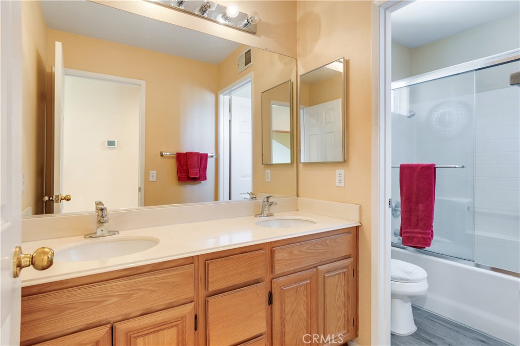 20776 Freeport Drive Riverside, CA 92508 - Photo 6 of 29 a bathroom with a sink and a mirror