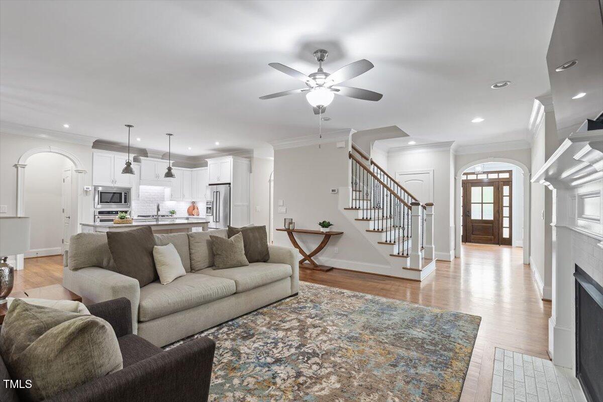 715 Kimbrough Street Raleigh, NC 27608 - Photo 11 of 42 a living room with furniture and wooden floor
