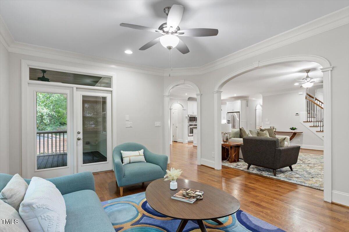 715 Kimbrough Street Raleigh, NC 27608 - Photo 17 of 42 a living room with furniture and a wooden floor